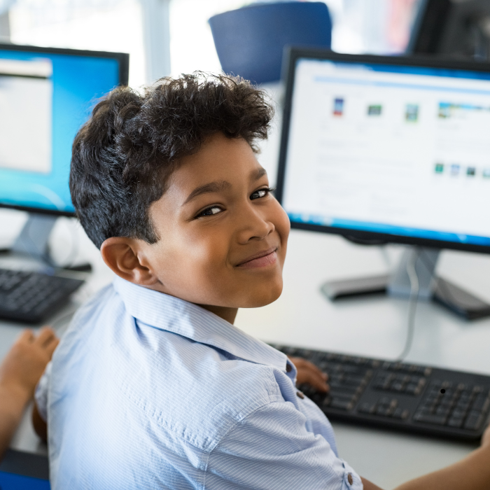 Indian students learning computers and technology in school IT lab