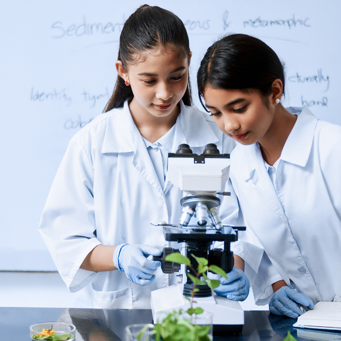 Indian school students conducting science practicals in laboratory