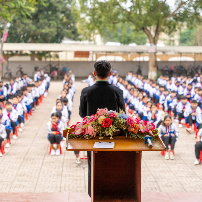 Indian school students sitting calmly in morning assembly prayer